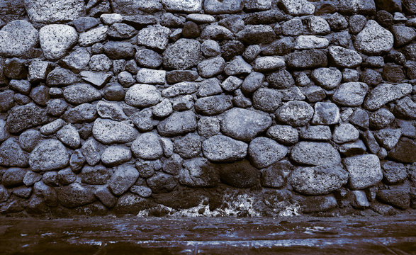 Old stonework wall, textured background with space for your insertion