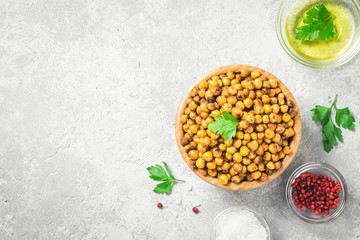 Vegan healthy snack,spicy roasted chickpeas in bowl.Top view, space for text.