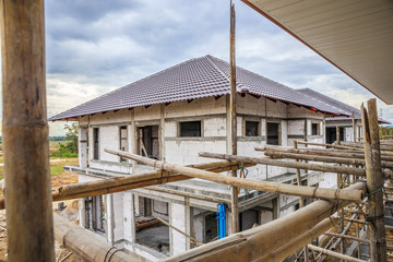 construction residential new house in progress at building site
