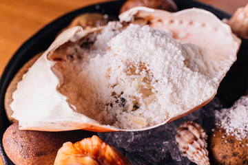 Creative Fine Dining: Crab mix with snow flake that made from macadamia, hoseradish and dashi-junsai served in crab shell and decorated with sea stone and shell.