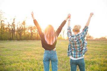 Fototapeta premium Two young women looking on the sunset.