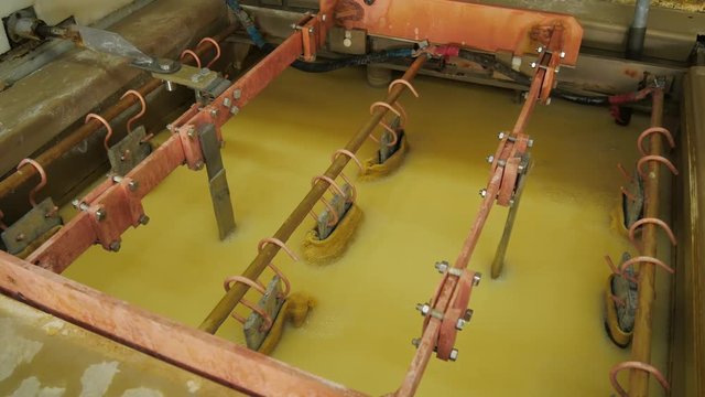 Galvanic bath, Engineering production. Circuit board in galvanic bath in the workflow