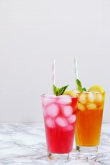 Iced lemonade isolated. Assortment of cold coctails in the glass