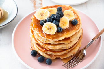 Homemade pancakes with blackberries and banana