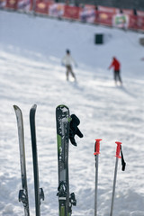 Set of equipment for skiing on winter resort, closeup photo