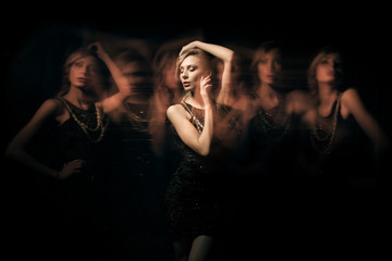 fashion portrait of blondie lady in dark dress with six translucent clone
