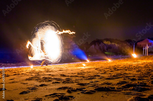 Holiday Lights In Abstract Slow Shutter >> Fire Show On The Beach Holiday Travelers Slow Shutter Speed Night Holiday Lights In Abstract Slow Shutter >> Fire Show On The Beach Holiday Travelers Slow Shutter Speed Night