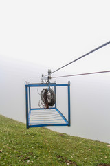 Old Primitive Cable Car in the foggy weather