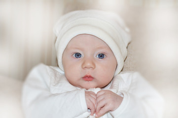 portrait of a baby in a hat