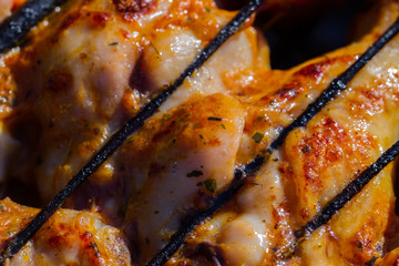 Grilled chicken in the garden. Barbeque.