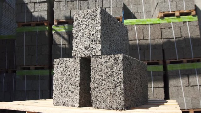 three cement building block on the background of the warehouse
