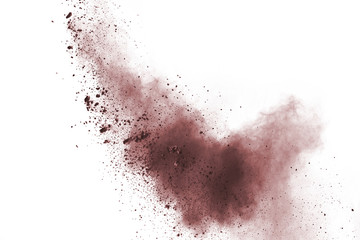 Brown powder explosion isolated on white background.