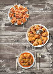 Pickled Cabbage rolls with traditional Crumpled cheese pie served on rustic ocher paper parchment place mat