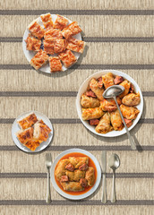 Pickled Cabbage rolls with traditional Crumpled cheese pie served on rustic ocher paper parchment place mat