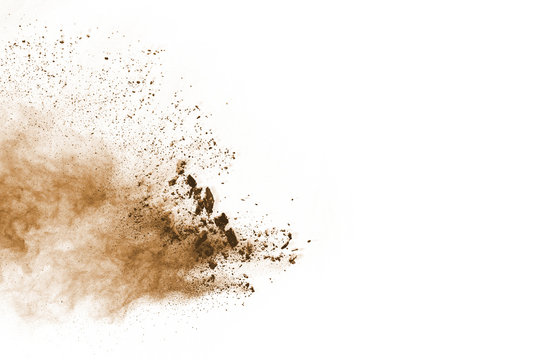 Brown Powder Explosion Isolated On White Background.