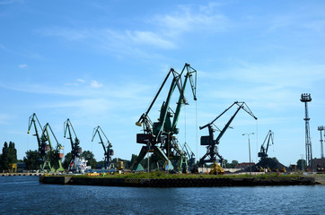 Fototapeta na wymiar Port machines in Gdansk, Baltic Sea, Poland