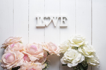 Wedding flower background on white wood
