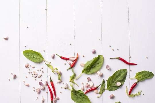 Ingredient Of Spices Vegetables On White Wood Table