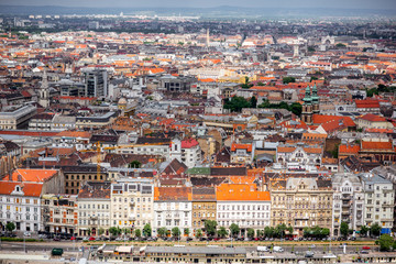 Obraz premium Top view on the riverside with residential buildings in Budapest city, Hungary