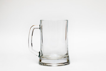 Empty beer mug on a white background