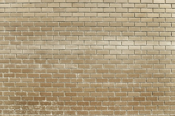 Old beige brick wall background