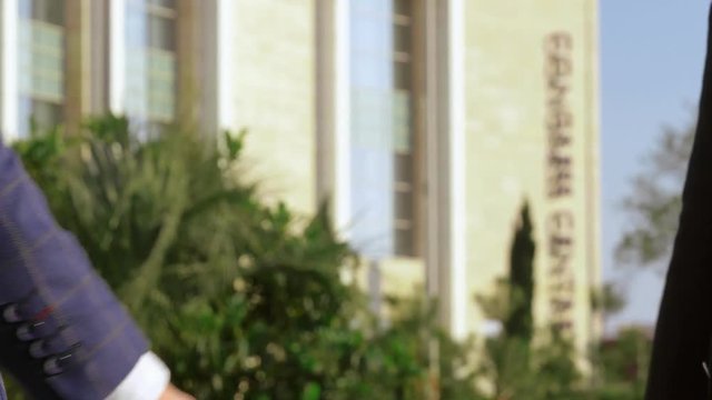 Successful completion of the transaction between the two businessmen.