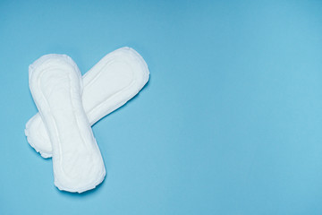 white sanitary napkin on a blue background