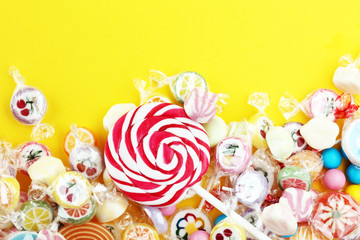 candies with jelly and sugar. colorful array of different childs sweets and treats.