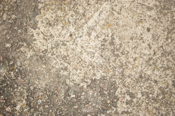 Wall fragment with scratches and cracks