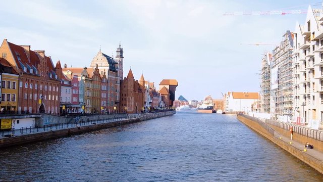 A view of the Motława River and an iconic port crane in Gdask, Poland