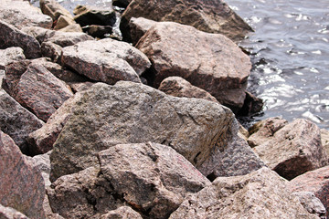 Fototapeta na wymiar granite stones on the ocean shore