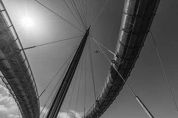 Obraz premium Pescara, Italy - 31 May 2018 - The Ponte del Mare monumental bridge and the Ferris wheel on the beach, in the canal and port of Pescara city, Abruzzo region