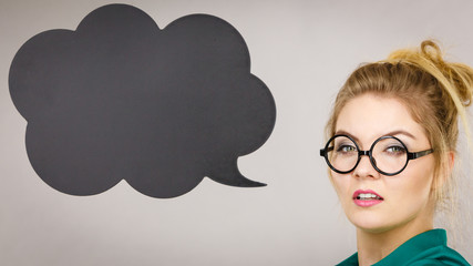 Confident rude business woman with thinking bubble