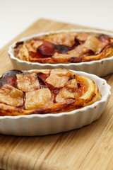 Tartelette with tomatos, chorizo and parmesan