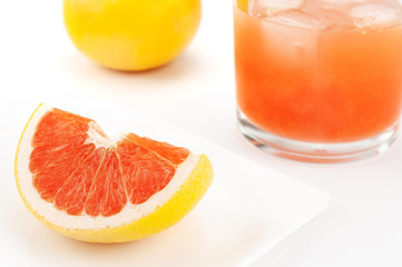 Fototapeta na wymiar Fresh grapefruit on white background