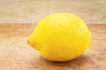 Lemon on wooden background