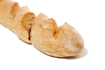 Traditional baguette on white background