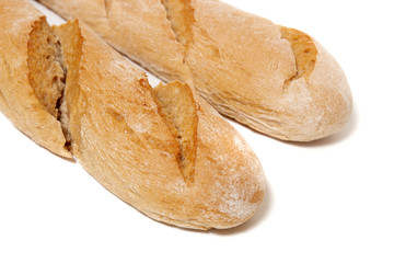 Traditional baguette on white background