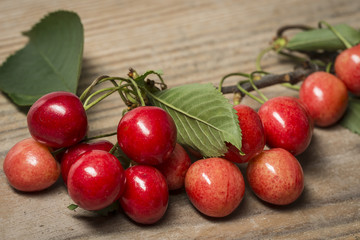 Fresh red cherries on a wooden table