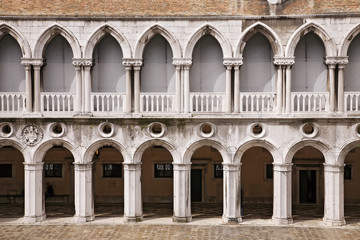 Fototapeta na wymiar Doge`s Palace (Palazzo Ducale) in Venice, Italy. Doge`s Palace is one of the main travel attractions of Venice. Old architecture of Venice. Historical landmarks in Venice. Walk in the Palazzo Ducale.