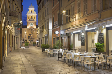 Parma - The street of the old town at dusk.