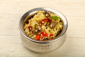 Bulgur with chicken hearts
