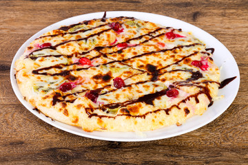Sweet pizza with fruits