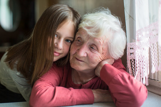 Portrait of little girl and her grandmother.