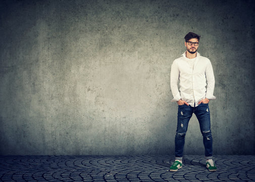Trendy hipster man on gray background