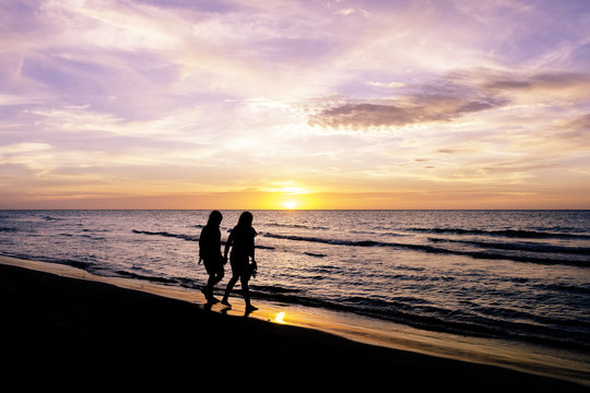 Friendship during sunset on the Cuban beach - Varadero, Cuba