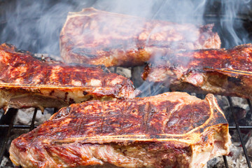 Steak Cooking On An Open Grill
