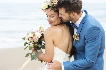 Young couple getting married at the beach