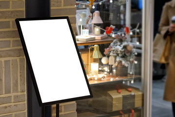 Blank vertical billboard in modern shopping mall 2