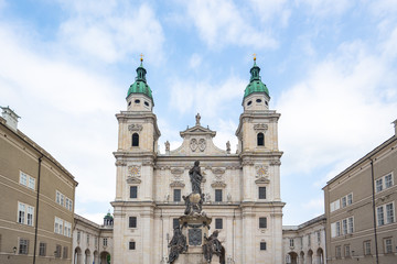 Fototapeta na wymiar Marien Statue with Salzburg Cathedral in Salzburg, Austria